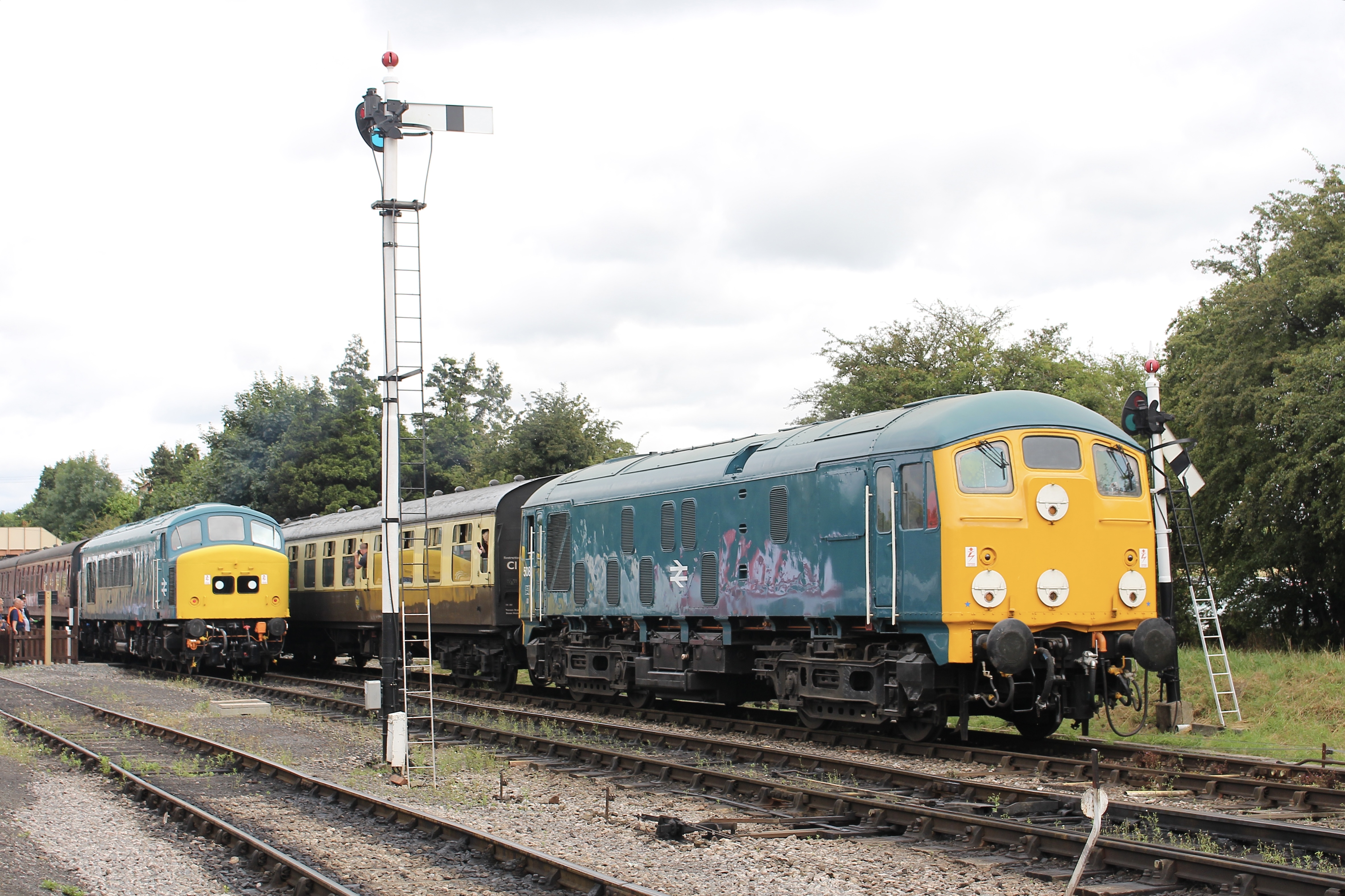 GWSR resident Class  24 no. 24081 departs Toddington with class 45 no. 45149 waiting pic Joshua Brinsford copy.jpeg