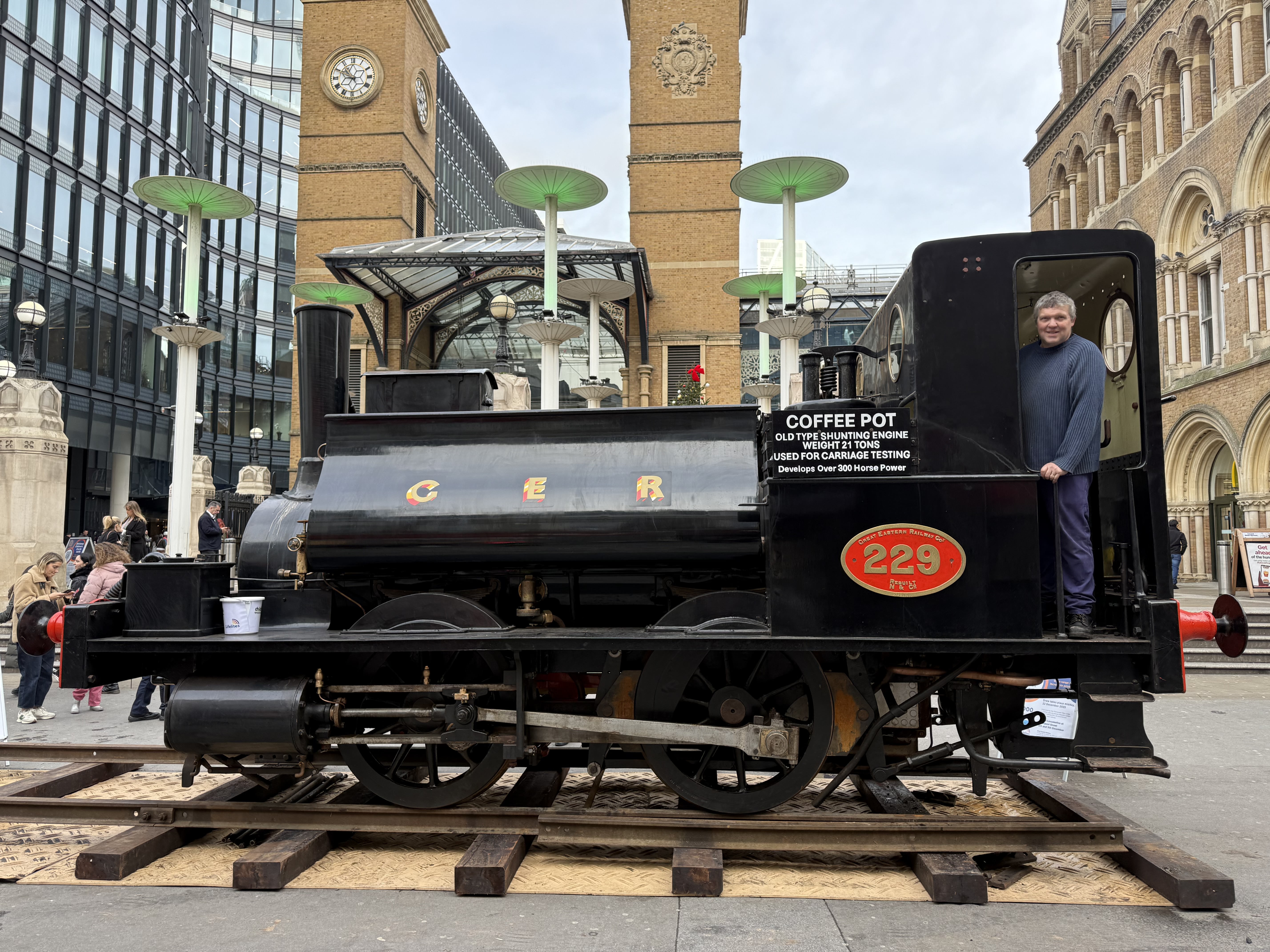 Homecoming for 229 ti Liverpool Street Geoff Phelps on footplate.jpeg